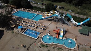 Indoor pool, seasonal outdoor pool, pool umbrellas, sun loungers