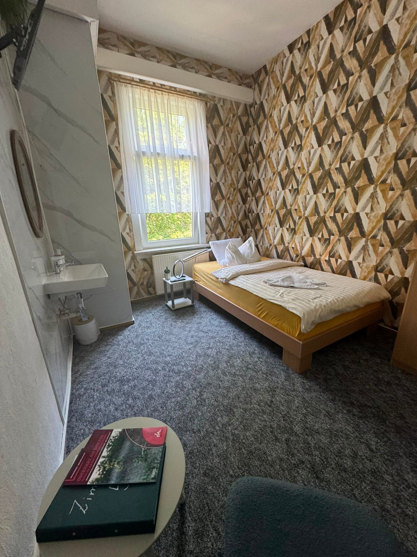 Eenpersoonskamer, gemeenschappelijke badkamer