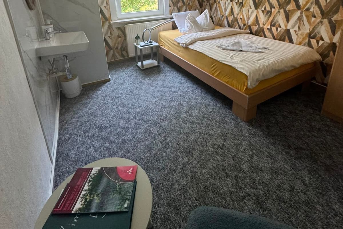 Eenpersoonskamer, gemeenschappelijke badkamer