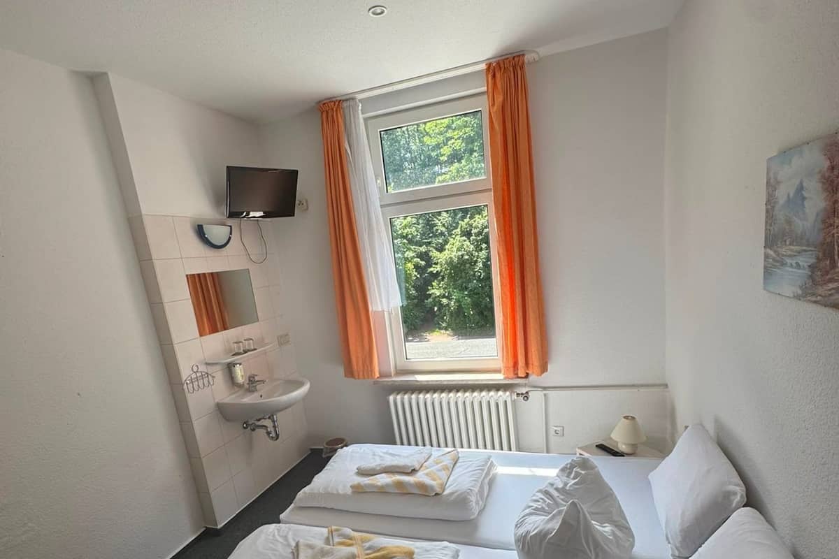 Tweepersoonskamer, gemeenschappelijke badkamer