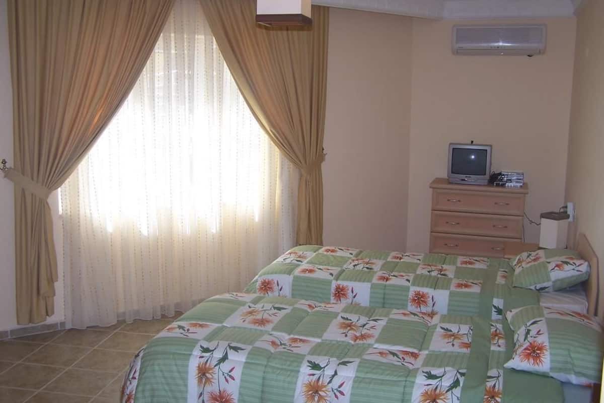 Apartment, 2 Bedrooms | 1 bedroom, in-room safe, desk, iron/ironing board
