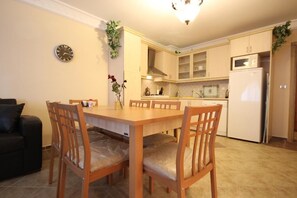 Fridge, oven, electric kettle, cookware/dishes/utensils