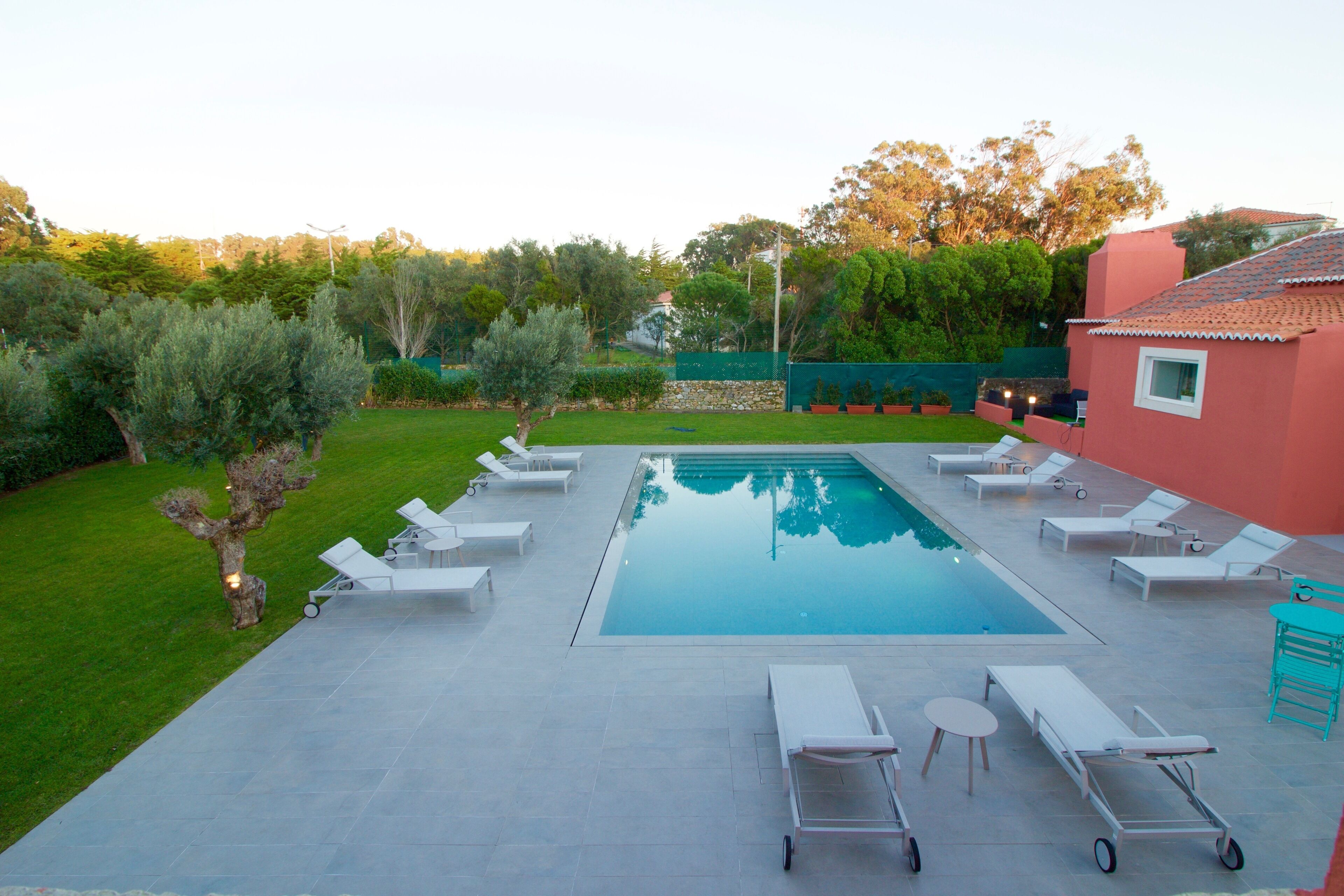 outdoor pool, open 8:00 am to 8:00 pm, pool loungers