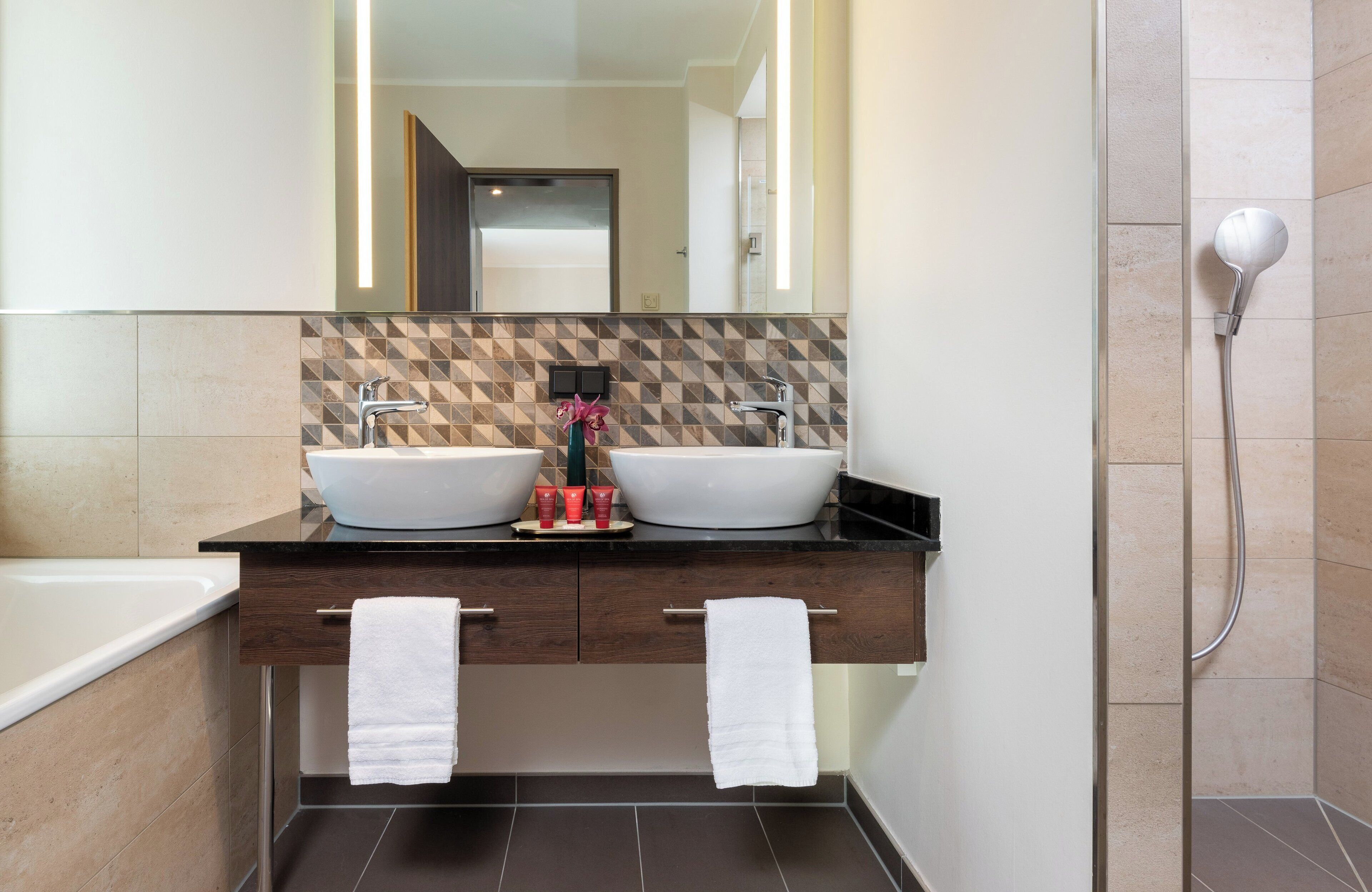 junior suite | bathroom | hair dryer, towels