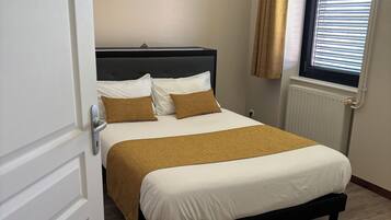 Departamento estándar | 1 habitación, ropa de cama de alta calidad, minibar y cortinas blackout