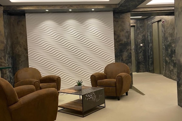 0-inch flat-screen TV with digital channels, TV