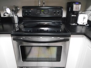Condo | Private kitchen | Full-sized fridge, microwave, oven, stovetop