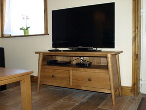 Apartment, 2 Bedrooms, Garden View (Exquisite Apartment) | Living area | 55-inch flat-screen TV with satellite channels, TV, DVD player - Seaside holiday Apartments (Rush)