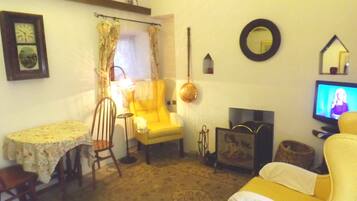 Cottage, 2 Bedrooms | Living area | Fireplace