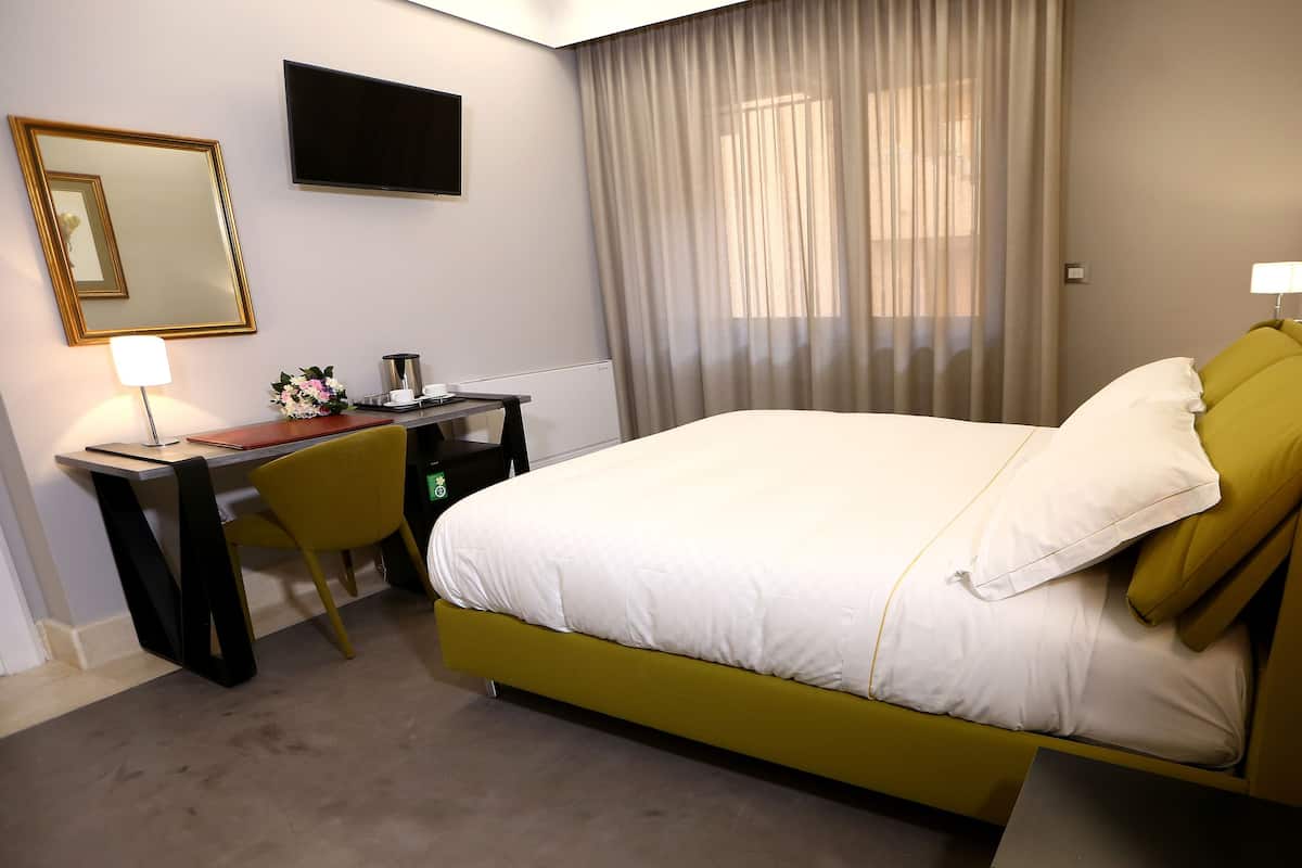 2 habitaciones, minibar y caja de seguridad en la habitación