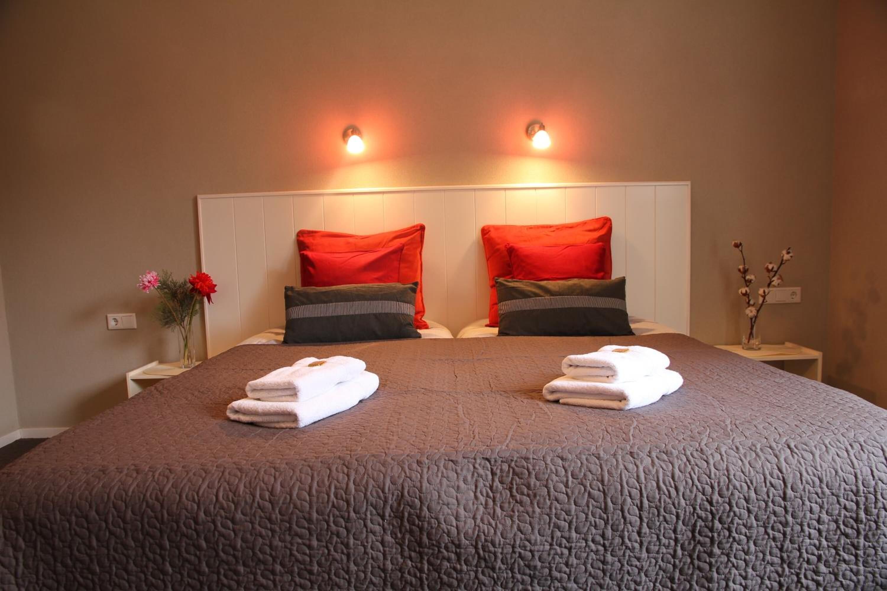 premium bedding, desk, iron/ironing board, free cots/infant beds