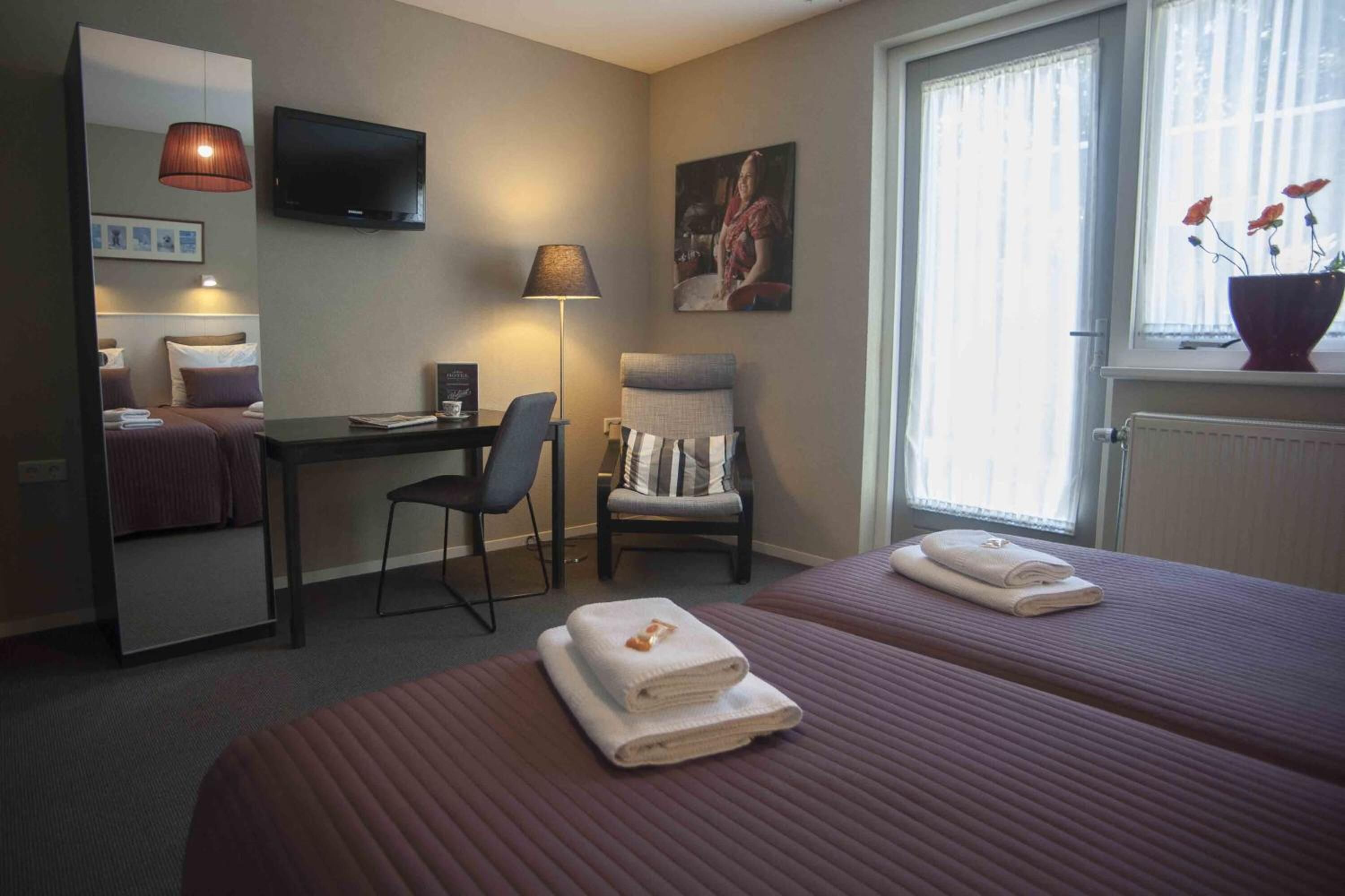 premium bedding, desk, iron/ironing board, free cots/infant beds