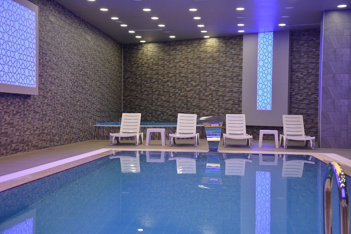 indoor pool, pool loungers