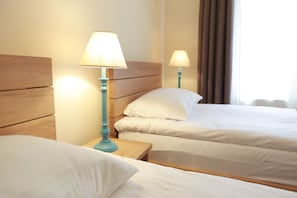 Premium bedding, iron/ironing board, rollaway beds, free WiFi
