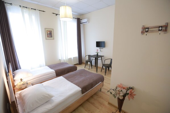 Premium bedding, iron/ironing board, rollaway beds, free WiFi