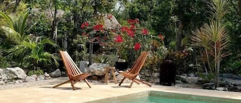 Outdoor pool, open 9:00 AM to 10 PM, pool umbrellas, sun loungers