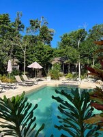 Outdoor pool, open 9:00 AM to 10 PM, pool umbrellas, sun loungers