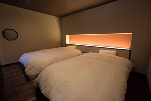 Habitación tradicional con 2 camas individuales (JP W. Style, Twin Bed 46 square meter) | Ropa de cama de alta calidad y edredón 