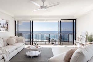 2 Bedroom Signature Apartment with Ocean View | Living area | Flat-screen TV, DVD player