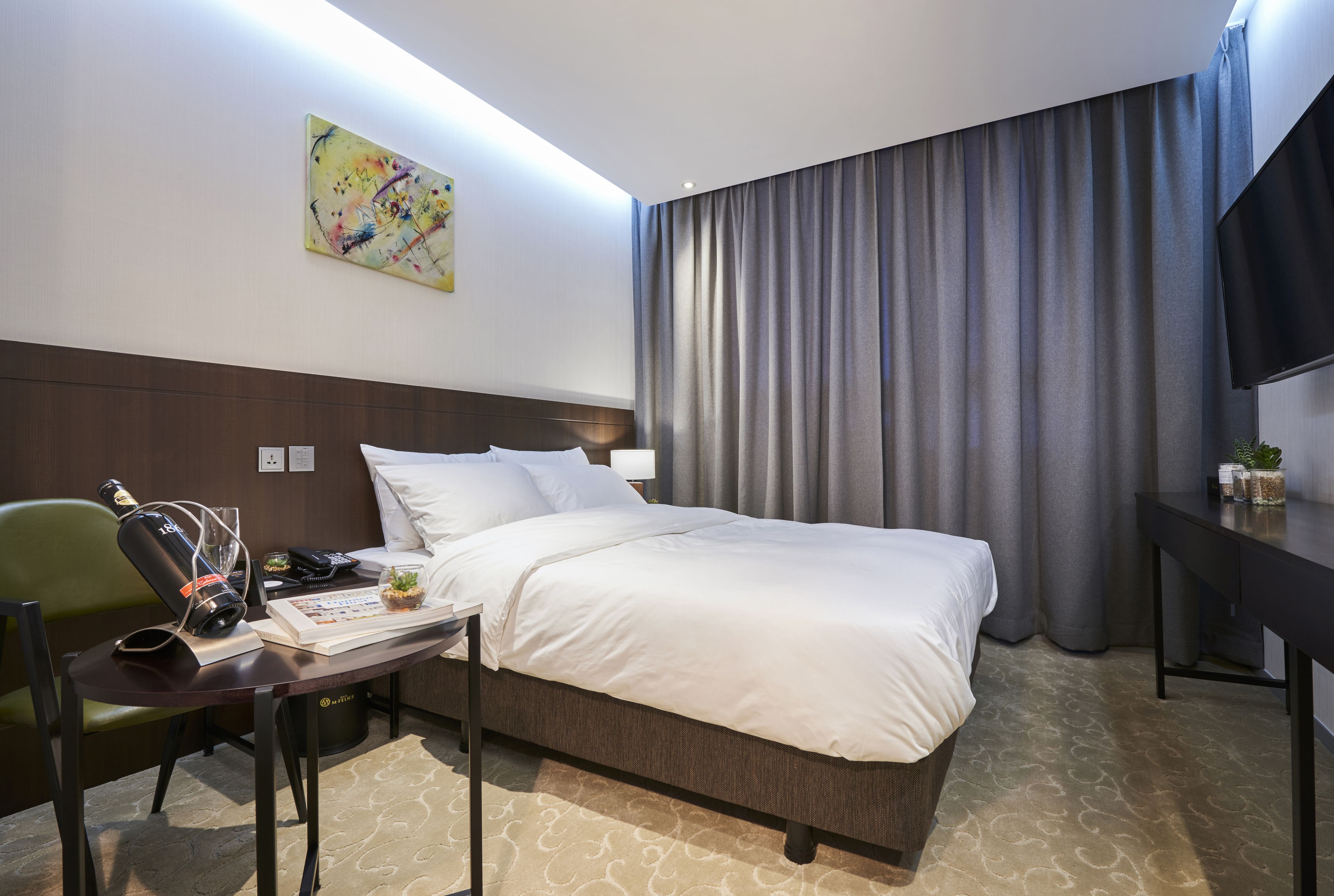 deluxe double room | in-room safe, desk, blackout curtains, soundproofing