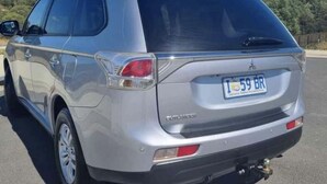A silver SUV with a visible license plate. - Fantastic getaway for family or friends with spectacular views. (Snug)