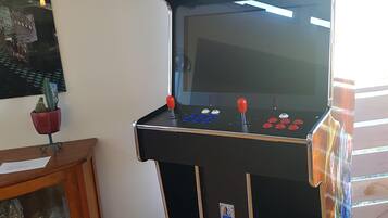 Play classic arcade games like Mortal Kombat in this room.