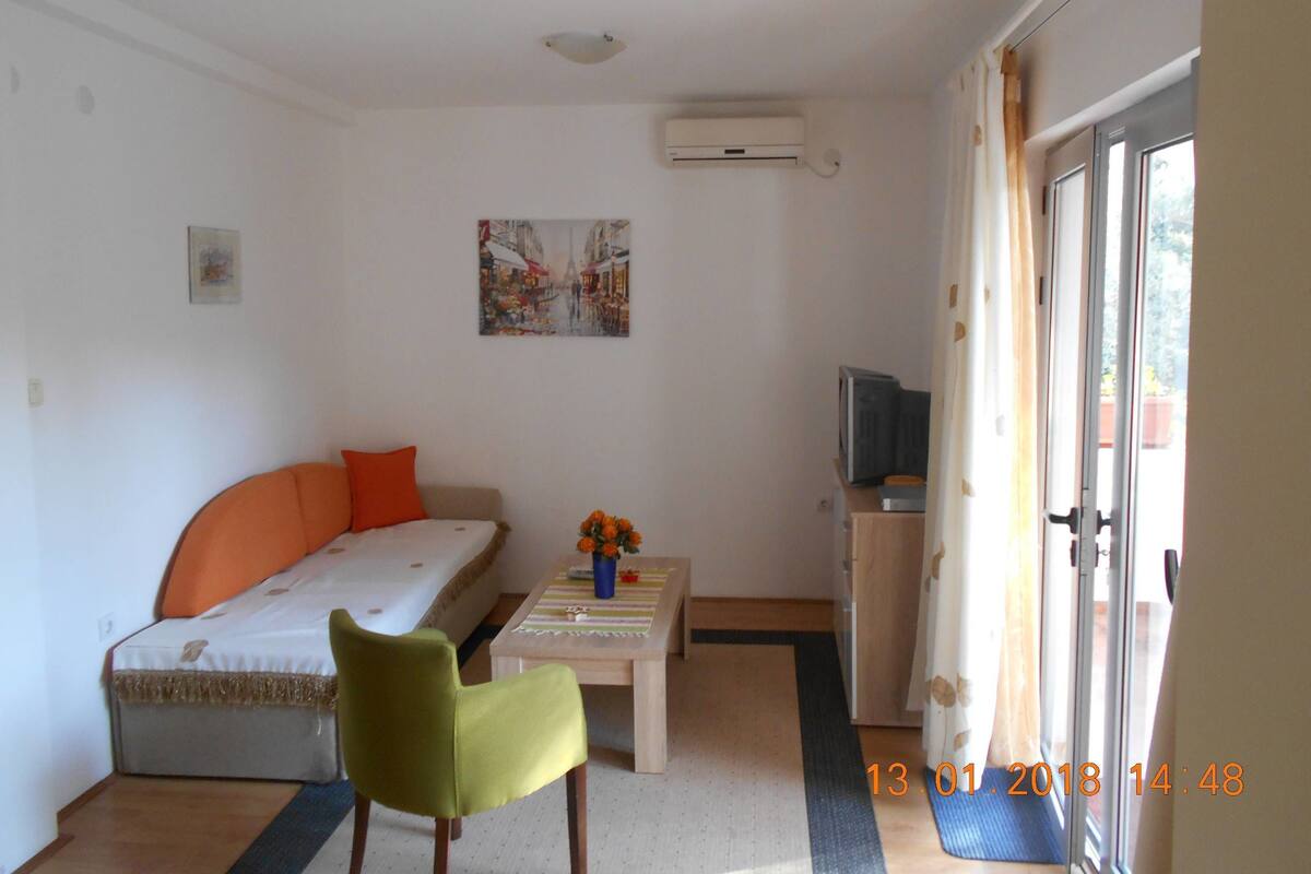 Family Apartment, 1 Bedroom, Pool Access, Sea View | 1 bedroom, desk, laptop workspace, free WiFi