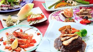 A variety of dishes on a table, including seafood, vegetables, and a dessert. - morinoakari (Hakone)