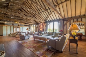 Ground floor: Large seating area with wood burning stove as the centre piece to the room