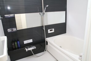 Standard 202 Non-Smoking | Bathroom | Separate bathtub and shower, free toiletries, hair dryer, slippers