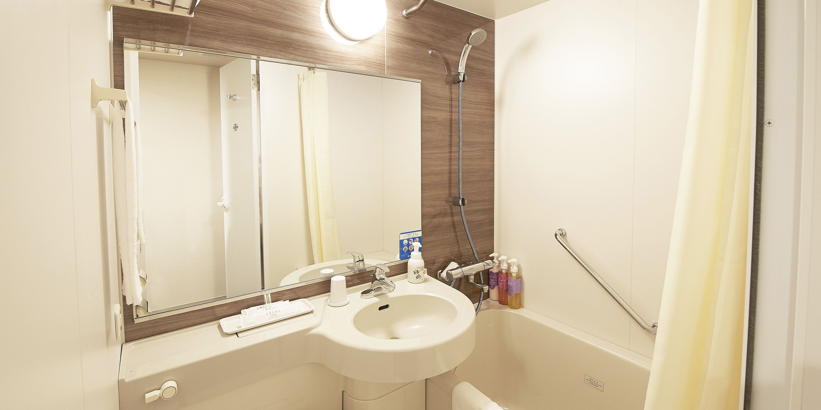 combined shower/bathtub, free toiletries, hair dryer, slippers