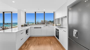 3 Bedroom Beach Front, Ocean View Apartment | Private kitchen | Fridge, microwave, oven, stovetop