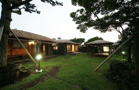 Front of property - evening/night. Chan's House Pension