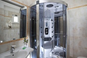 Shower, free toiletries, towels