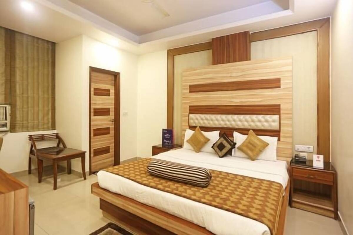 Habitación individual Deluxe, 1 cama matrimonial, para no fumadores (Air conditioned ) | Sala de estar | Televisión de pantalla plana