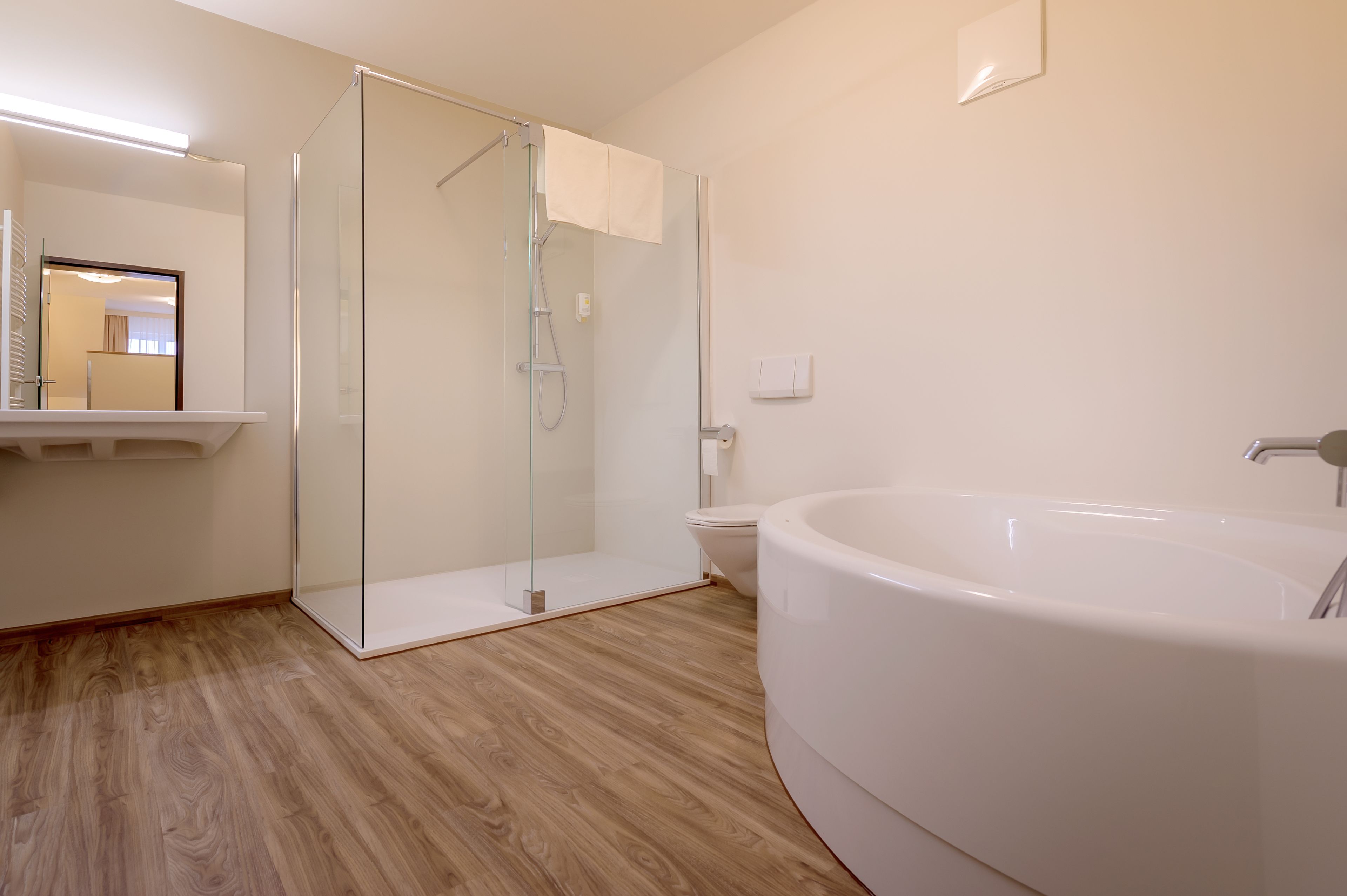 deep-soaking bathtub, hair dryer, towels