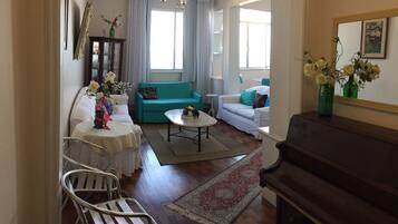 Apartment, 2 Bedrooms | Living area | 32-inch flat-screen TV with cable channels, TV