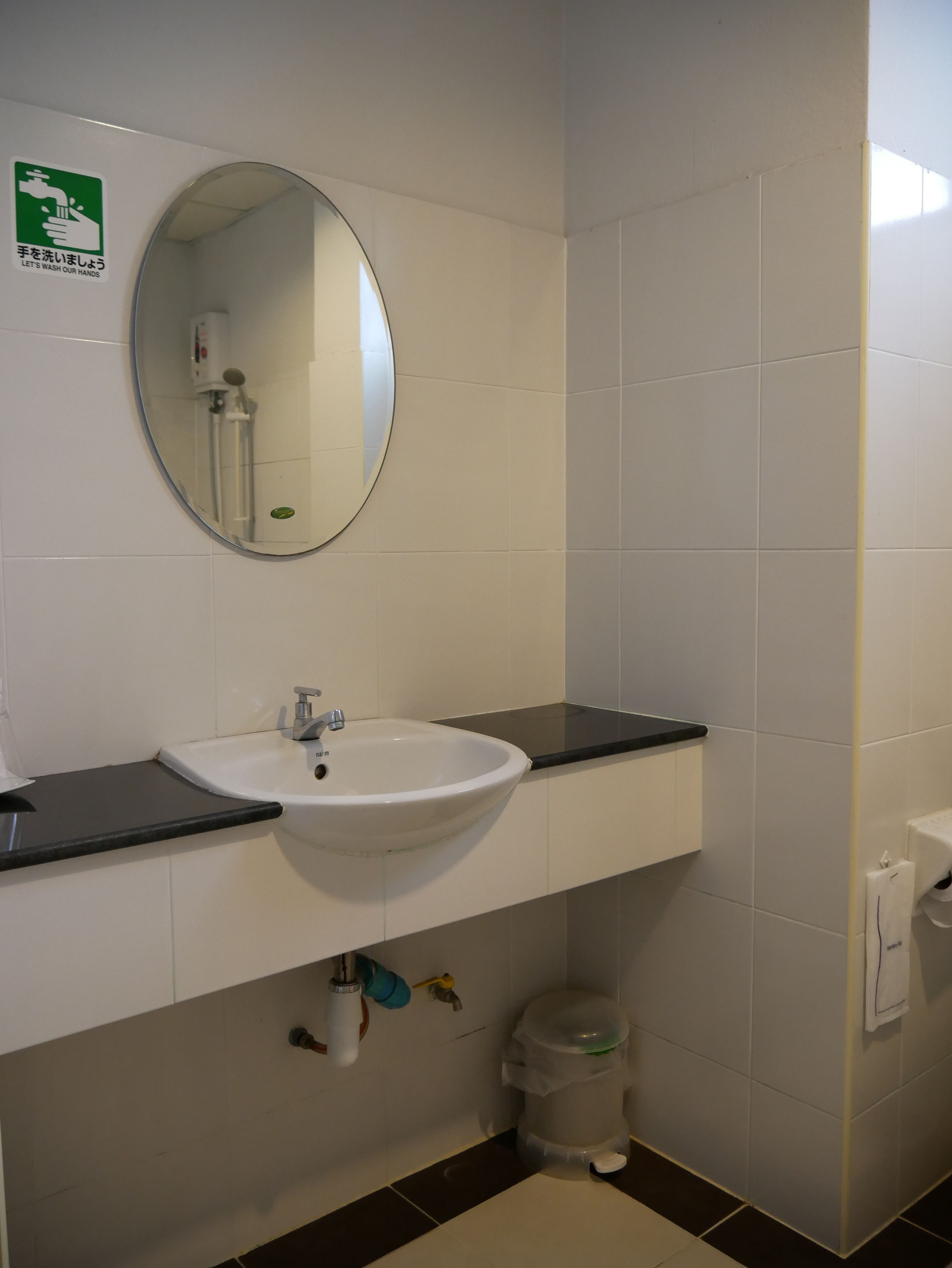 family triple room  | bathroom sink