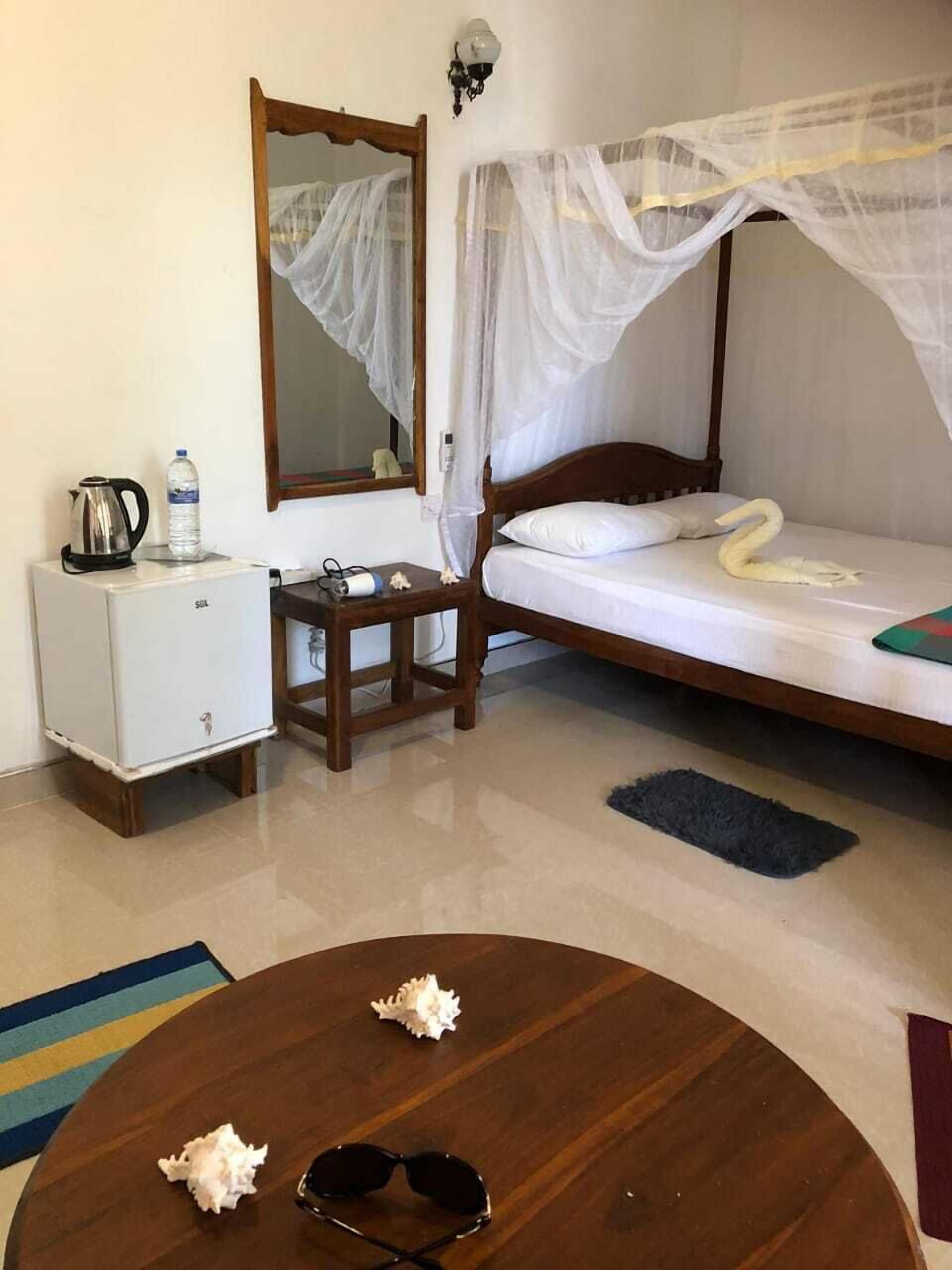 Deluxe tweepersoonskamer, 1 kingsize bed, uitzicht op tuin, op benedenverdieping | 1 slaapkamer, lakens van Egyptisch katoen, luxe beddengoed, een minibar