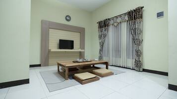 Family Villa | Living area | LED TV