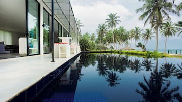 Outdoor pool, pool umbrellas, sun loungers