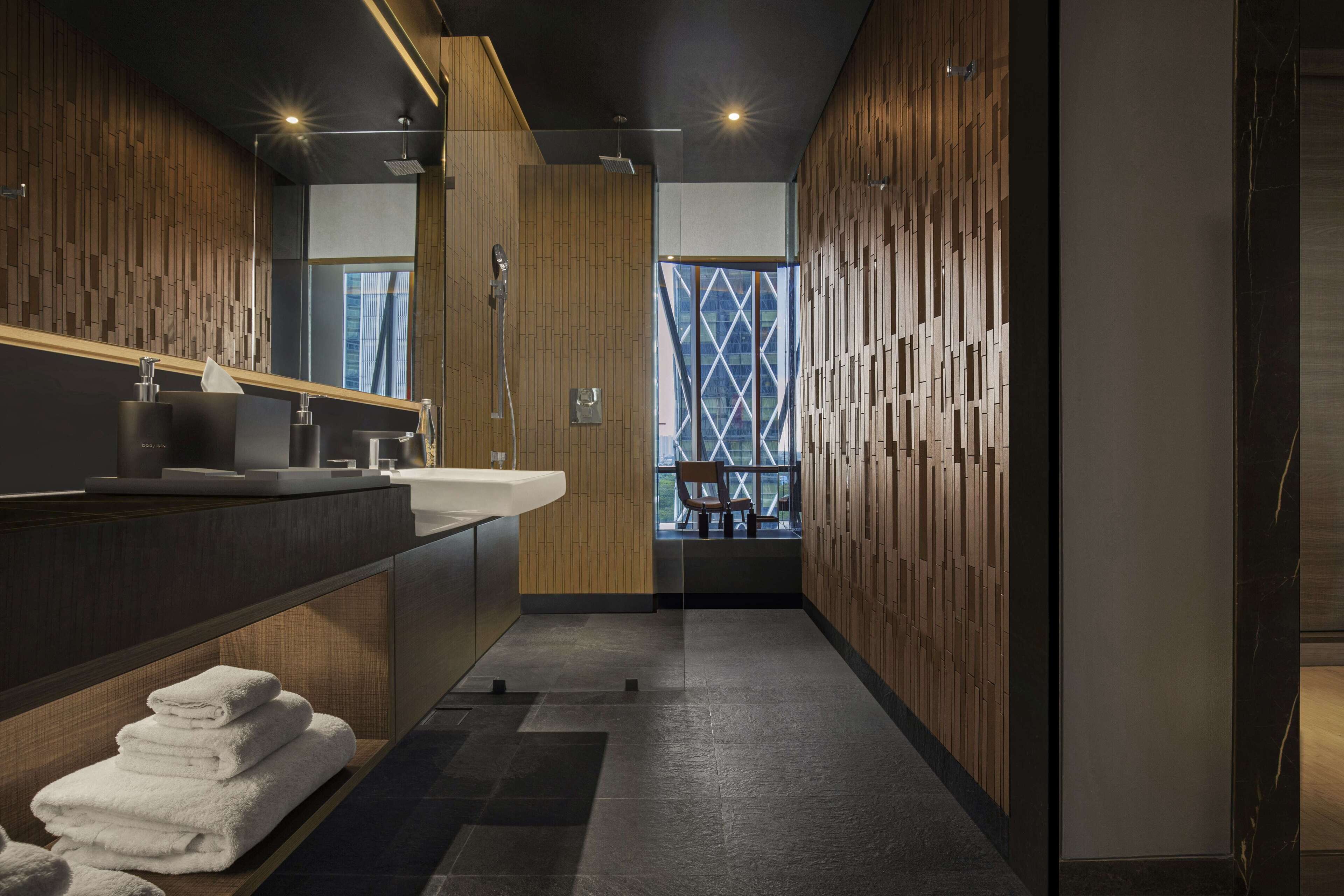 studio, 1 king bed | bathroom | designer toiletries, hair dryer, bathrobes, slippers