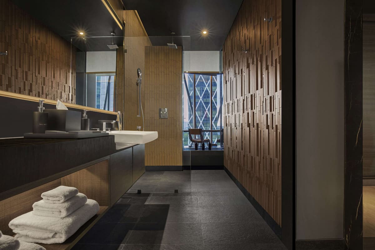 studio, 1 king bed | bathroom | designer toiletries, hair dryer, bathrobes, slippers