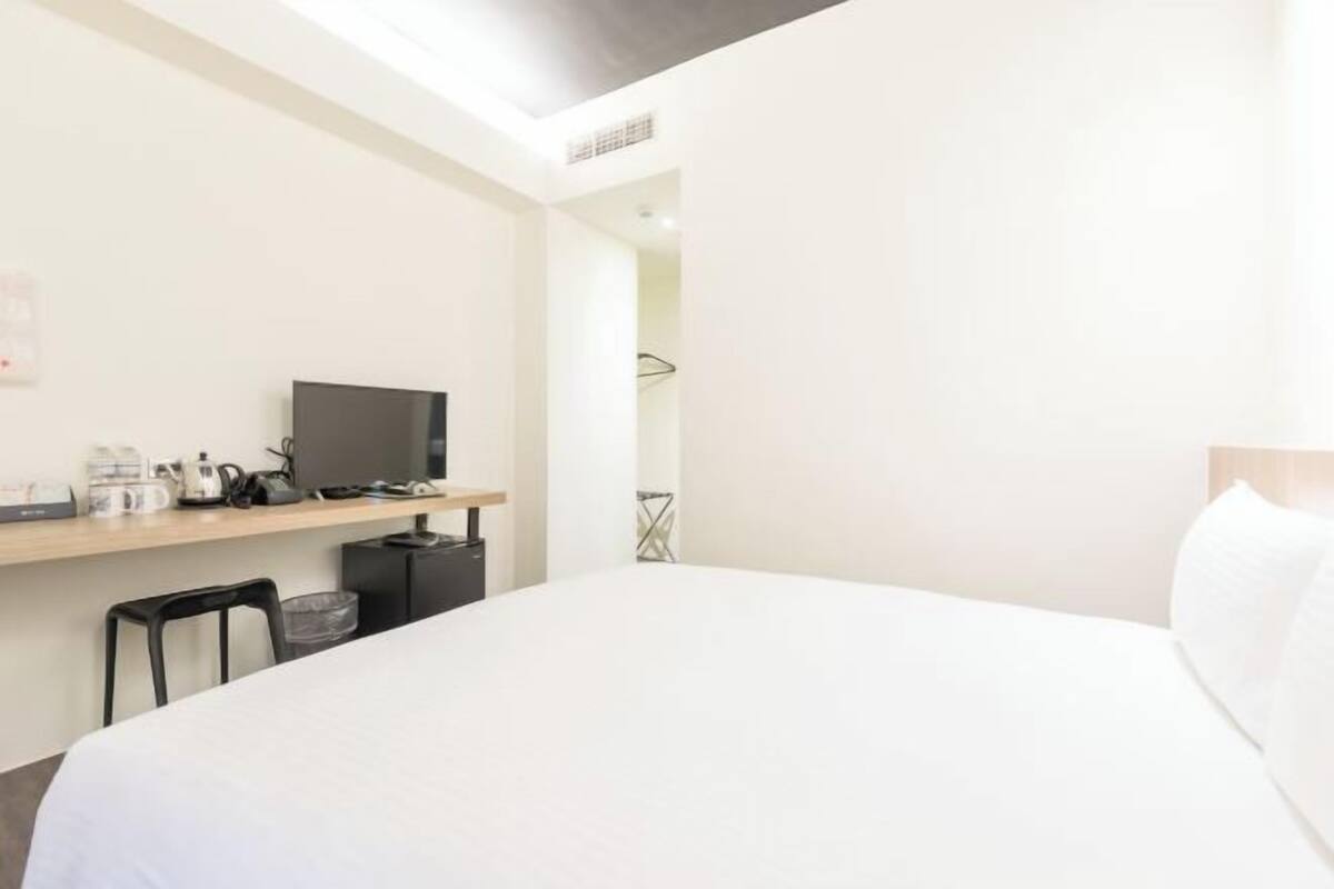 Desk, blackout drapes, WiFi (free), bed sheets