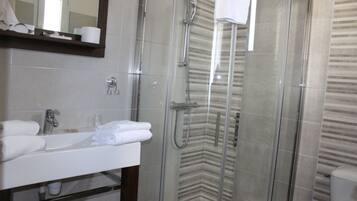 Shower, free toiletries, hair dryer, towels