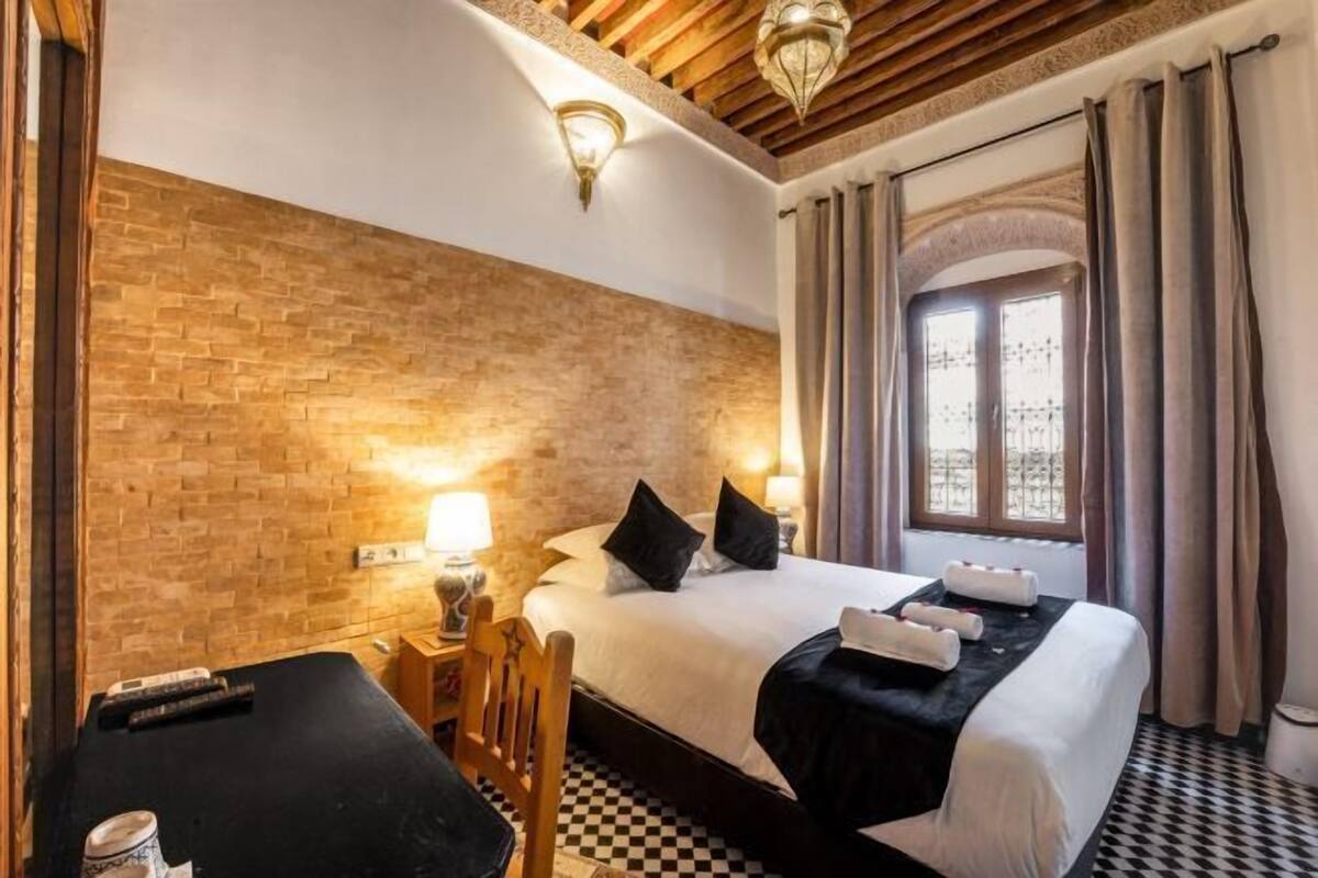 Ropa de cama de alta calidad, camas Select Comfort y cortinas blackout