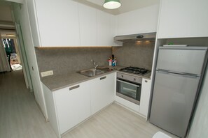 Fridge, microwave, oven, high chair