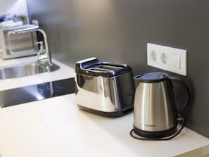 Fridge, microwave, coffee/tea maker, toaster