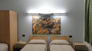 A hotel room with two beds, a large painting on the wall, and a nightstand with a phone. - Albergo Ristorante Fratte (Fregona)