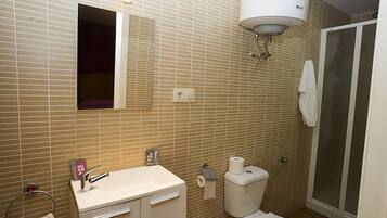 Shower, free toiletries, hair dryer, towels